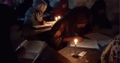 মোমবাতির আলোয় এসএসসি পরীক্ষা, ক্ষোভ পরীক্ষার্থী ও অভিভাবকদের