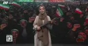 ইরানের টিভিতে লাইভ অনুষ্ঠানে অস্ত্র হাতে উপস্থাপক