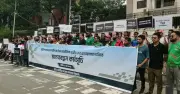 বাইকারদের মানববন্ধন: প্রস্তাবিত আয়কর প্রত্যাহারের দাবি