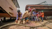 রোদ-বৃষ্টি উপেক্ষা করে শ্রমিকদের কঠোর পরিশ্রমের ছবি
