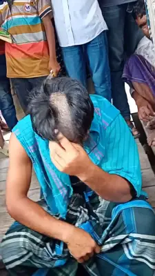 ফরিদপুরে মাদক সেবনের অভিযোগে গ্রাম পুলিশসহ দুজনের চুল কাটার ঘটনা