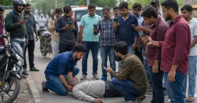 বিপদে পড়া মানুষকে সাহায্য না করে ভিডিও করা: বাইস্ট্যান্ডার ইফেক্টের নতুন মাত্রা