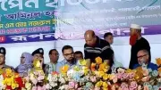 গ্রেপ্তারি পরোয়ানা থাকা বিএনপি নেতা পুলিশের অনুষ্ঠানের মঞ্চে